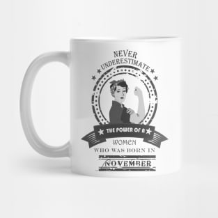 never underestimate the power of a women Mug